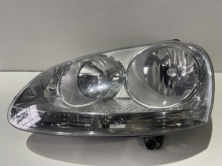 Фари оптика фара Гольф 5 03-09 Hella фари передні Golf 5 Jetta