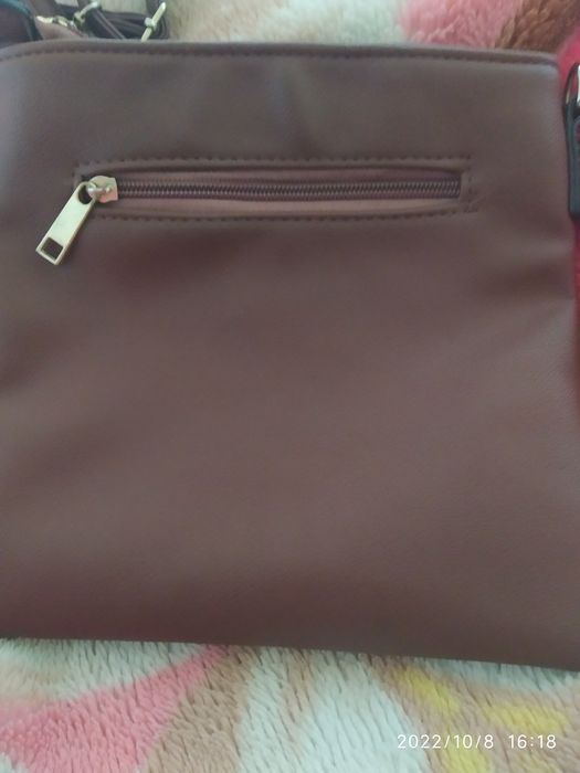 Жіноча сумка на бік.