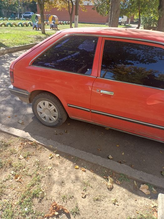 Мазда 323 Mazda автомобиль