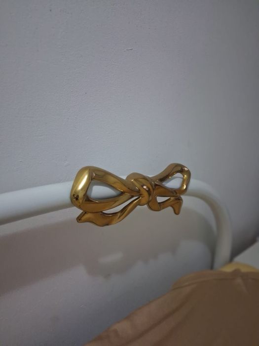 Cama de ferro com estrado
