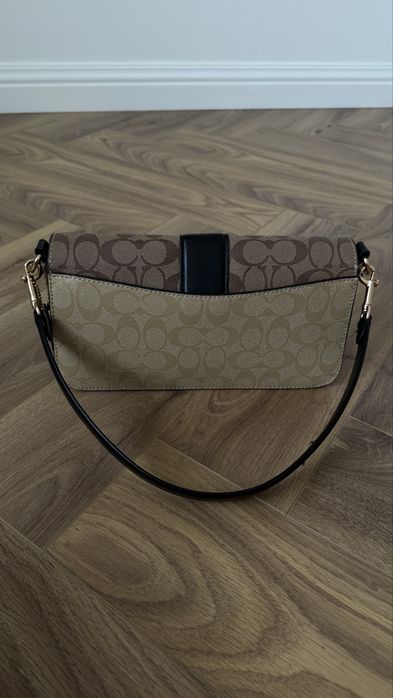 Сумочка від Coach
