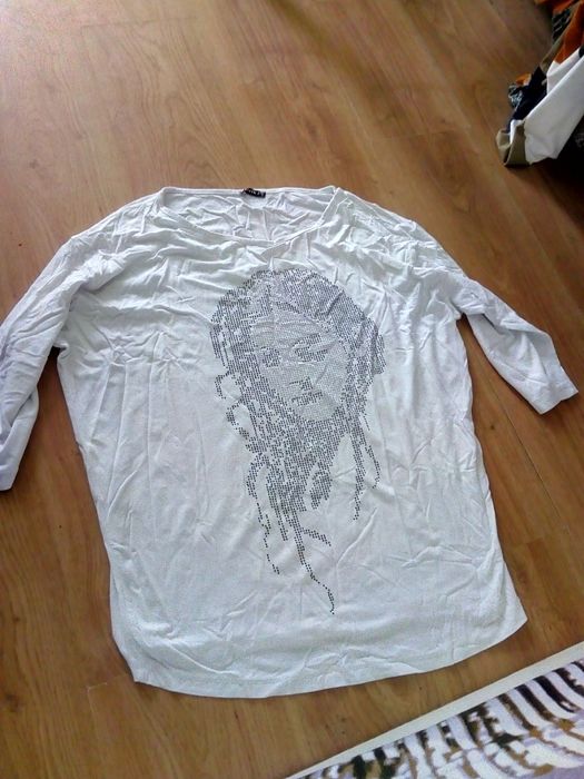 Bluzka damska elegancka rozmiar L.  .10