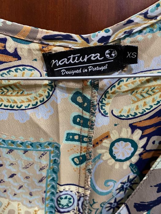 Macacão da marca NATURA