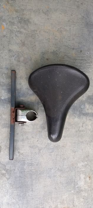 Сиденье для катания ребенка на раму велосипеда.