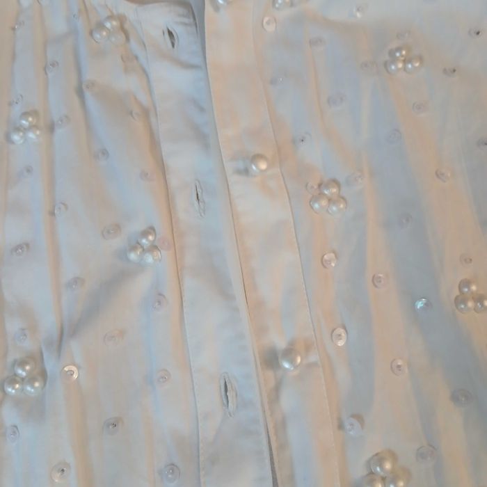 Biała koszula z koralikami