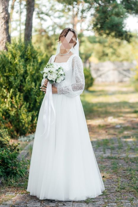 Ніжна весільна сукня