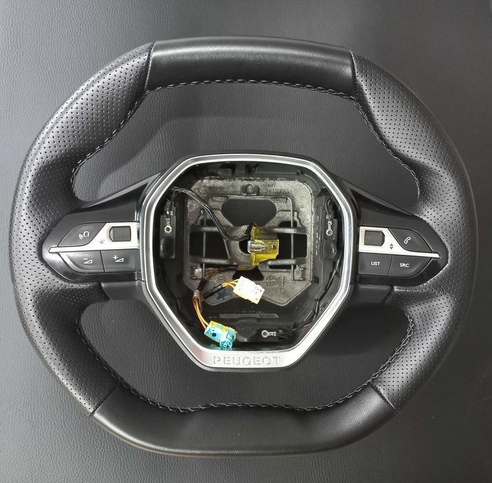 Перетяжка руля авто