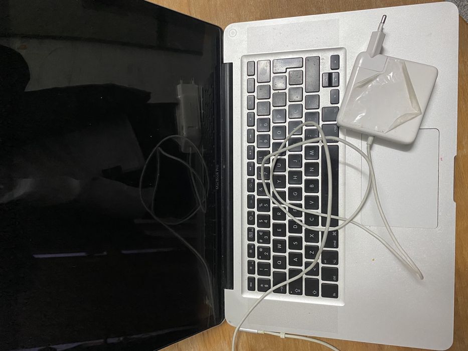 Macbook Pro for parts + charger64585249955202120