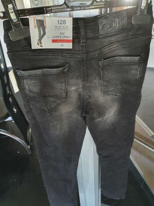 Calças ganga pretas novas