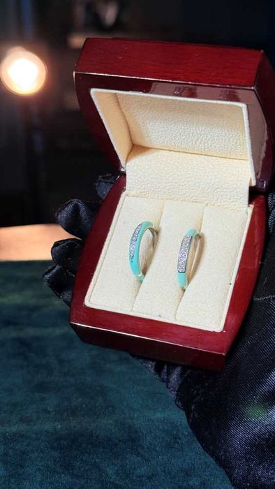 Брендовое золотое кольцо с керамикой