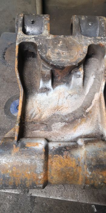 Spawanie staliwa żeliwa Mecalac jcb new holland