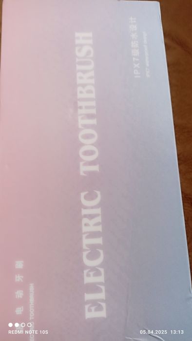 Нова електрична зубна щiтка.