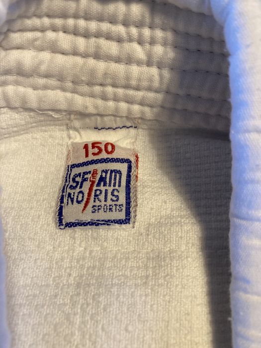 Fato de judo como novo