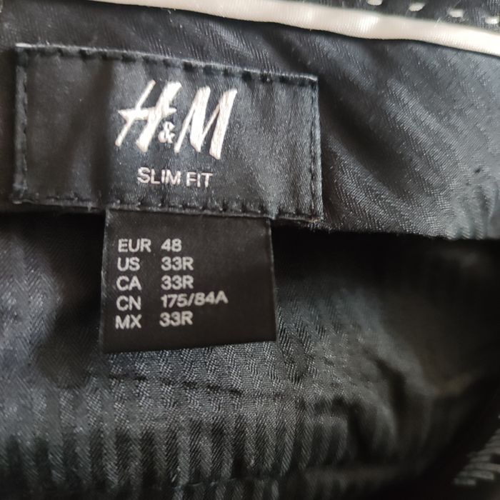 Nowe bez metki H&M r48 Eleganckie spodnie męskie materiałowe .