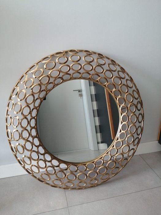 Lustro okrągłe w złotej oprawie