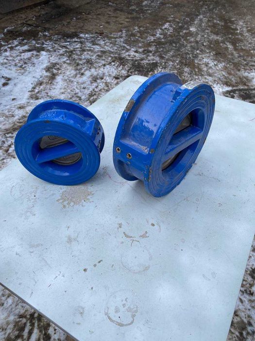 двухстворчатый меж фланцевый обратный клапан.