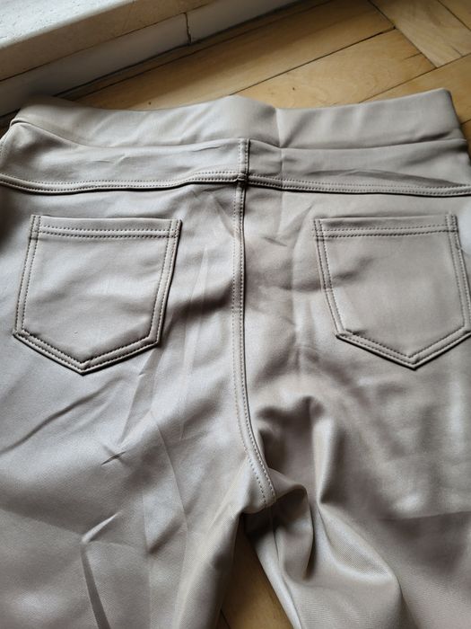 Spodnie leginsy jasny beż r. 44