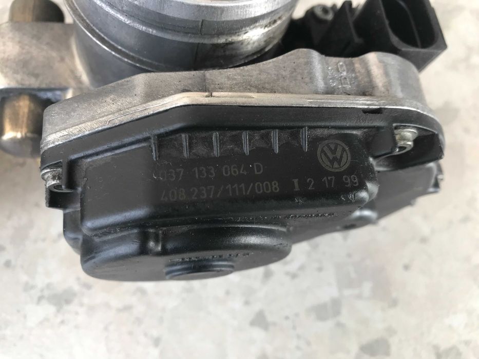 Дросельна заслонка Volkswagen Golf. Vento. Polo. Passat B5 - 1.6
