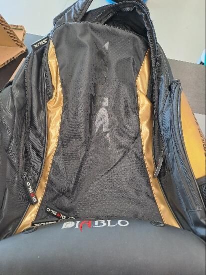 mochila siux dourado