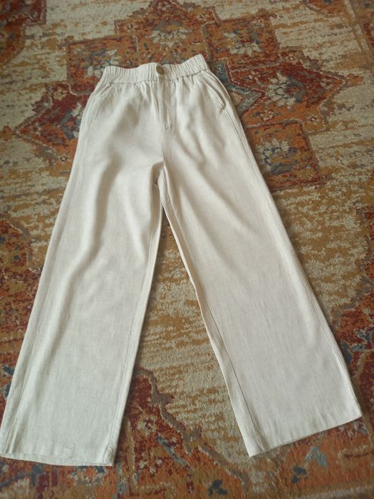 Beżowe lniane spodnie z wysokim stanem r.XS  Stradivarius