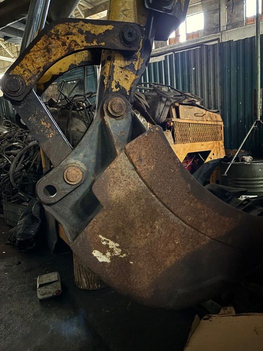 Екскаватор - навантажувач New Holland B-110-4PT