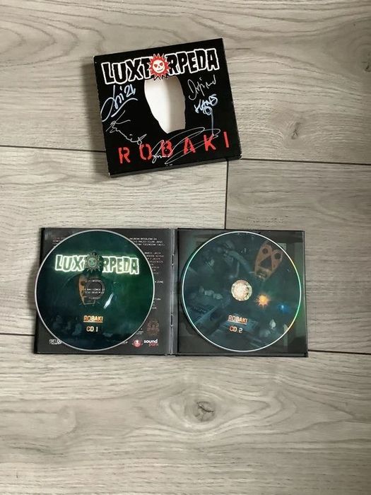 Luxtorpeda album CD Robaki z autografami