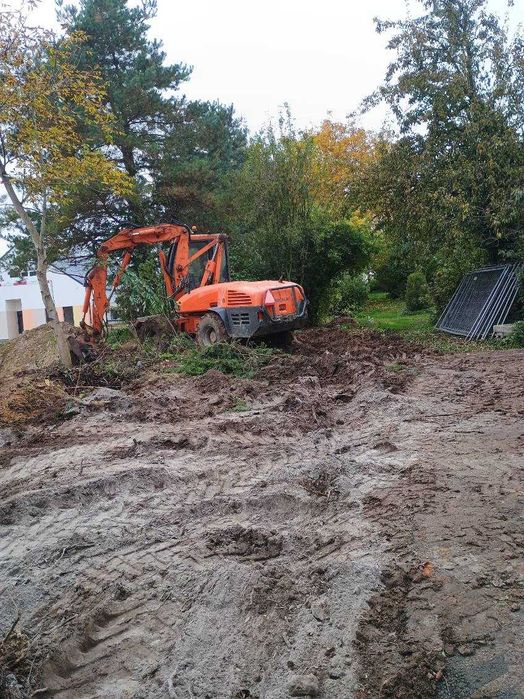 Usługi koparko ładowarką mecalac 12