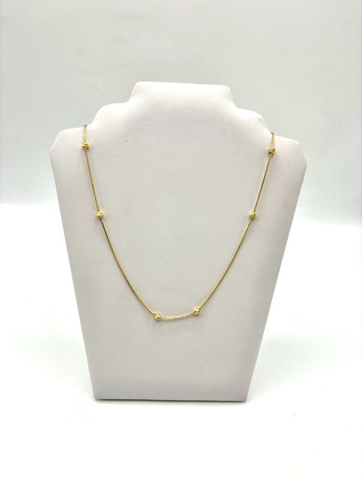 Złoty naszyjnik z kulkami rychomymi regulowany