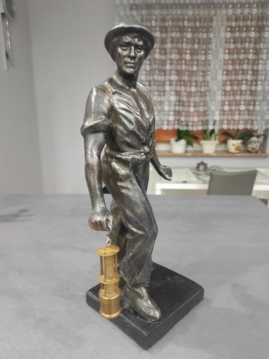 Stara figura górnika z cynkalu i mosiądzu.