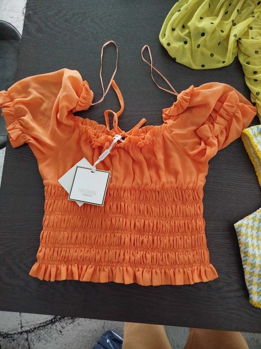 13 peças de roupa nova com etiqueta de marca Blusas/E Top 12.5€