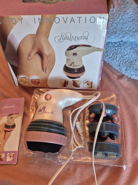 Компактний масажер