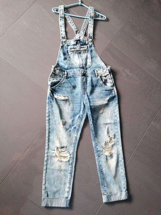 Jeansy ogrodniczki z dziurami L