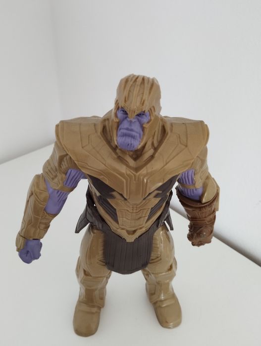 Thanos.                     .64409508954114127
