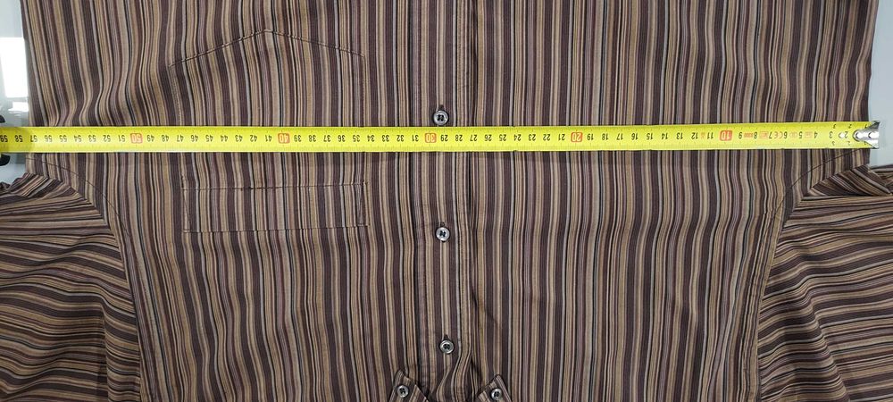 Camisa em excelente estado - L