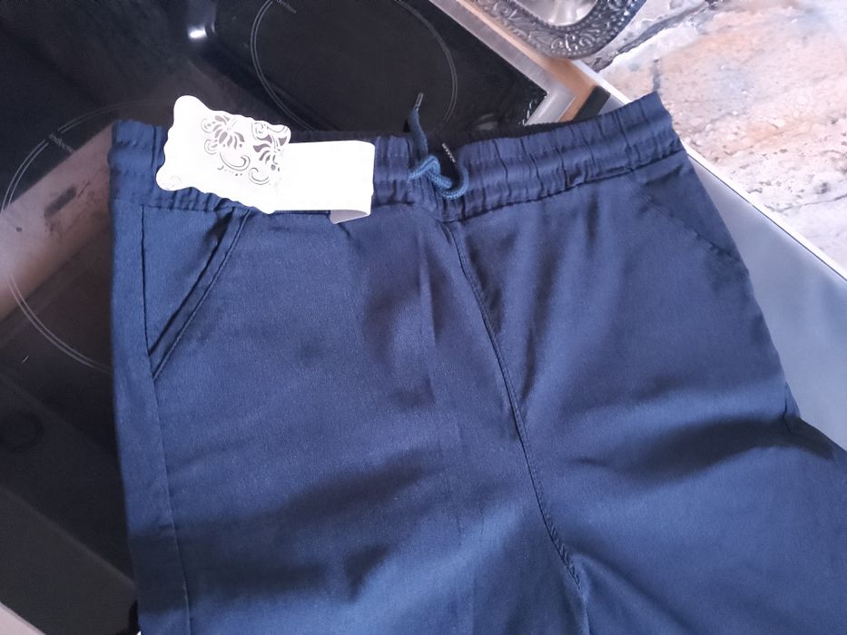 Nowe spodnie 2xl ciemny granat na gumce 3/4 nogawka