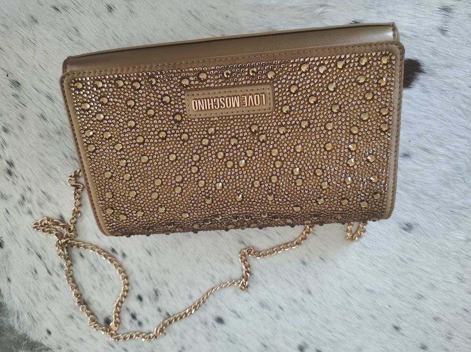 Vendo carteira tipo pochete, Love Moschino, dourada com brilhantes.