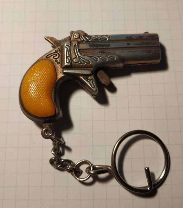 Brelok Derringer 995 podwójna lufa 6,5cm Zawieszka brąz - pomarańcz