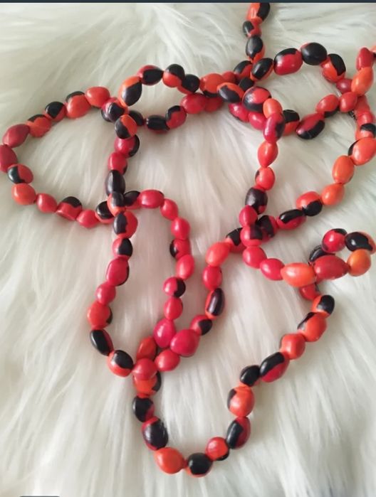 Amulet, goat eye necklace, protective guide
with goat eye seeds