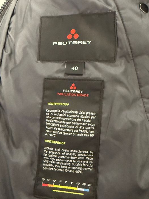 Продам брендований зимой пуховик