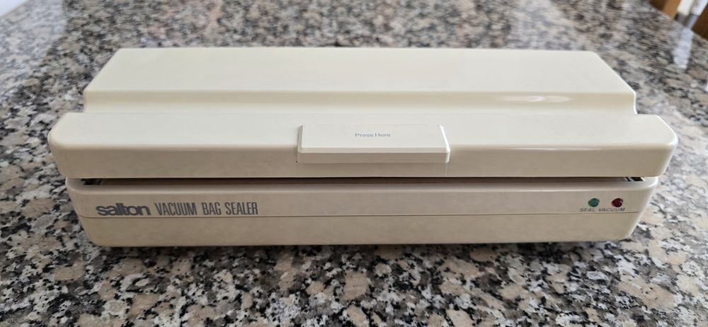 Selador a vácuo com recarga e Tupperware Picador frutos secos