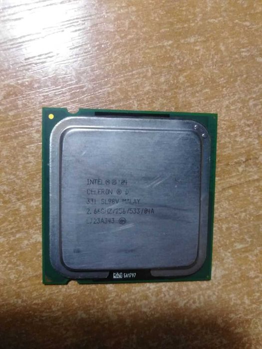 Процессоры  Intel® Celeron® D 331 и AMD Athlon ll (2) ADX2700