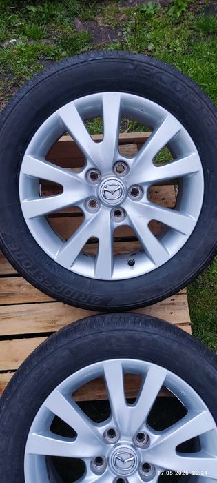 Felgi alu oryg Mazda 5x114,3 z oponami letnimi Bridgestone 205/55 R16, 4szt