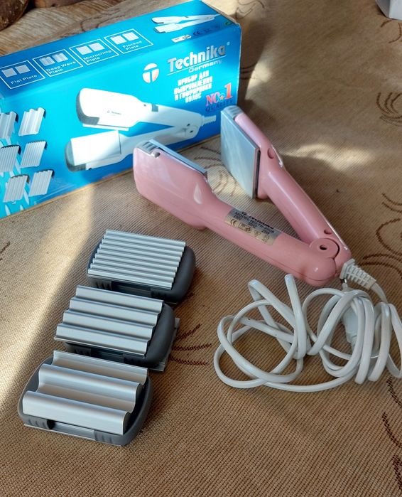 Прибор для выпрямления и гофрировки волос.