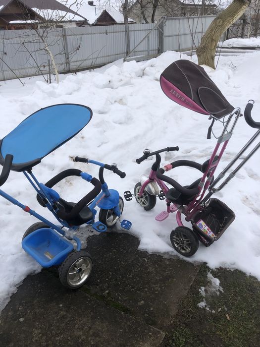 Дитячий велосипед з батьківською ручкою.