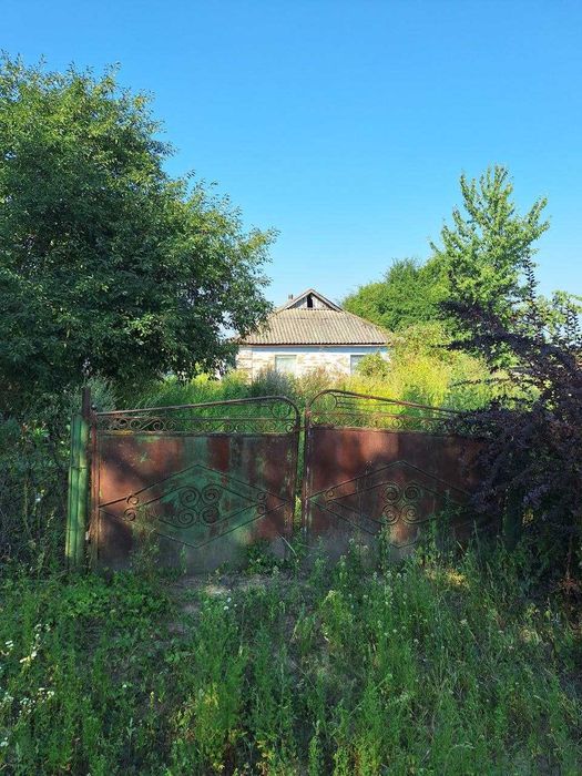 Продам земельну ділянку з будинком