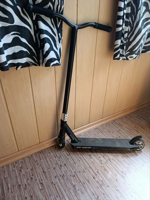 Трюковий самокат.