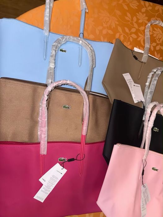 Malas Lacoste disponivel em várias cores
