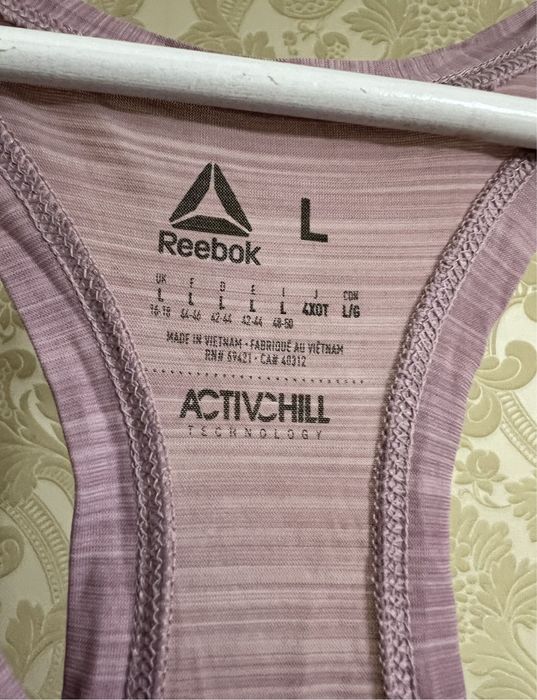 Жіноча спортивна майка Reebok Activchill