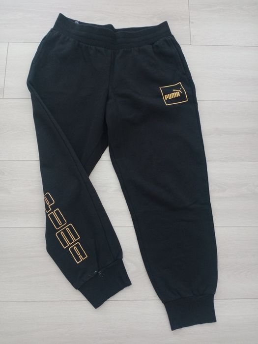 Spodnie PUMA złote napisy r. M