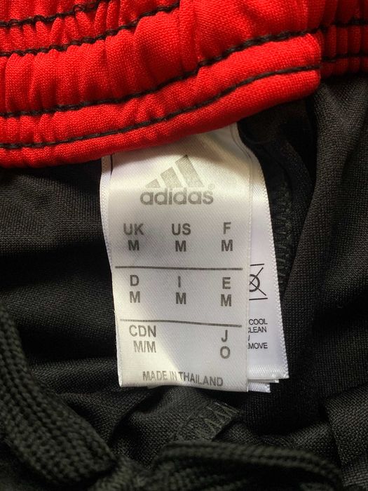 Calças de treino pretas e vermelhas do Manchester United 2021, 2022